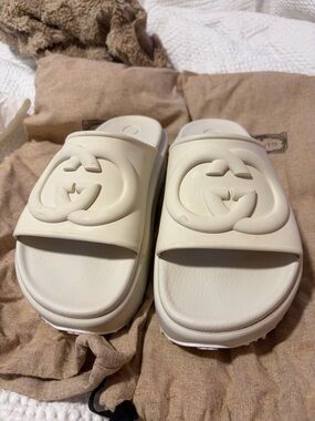 Gucci Ivory Rubber GG Logo Slide Sandals